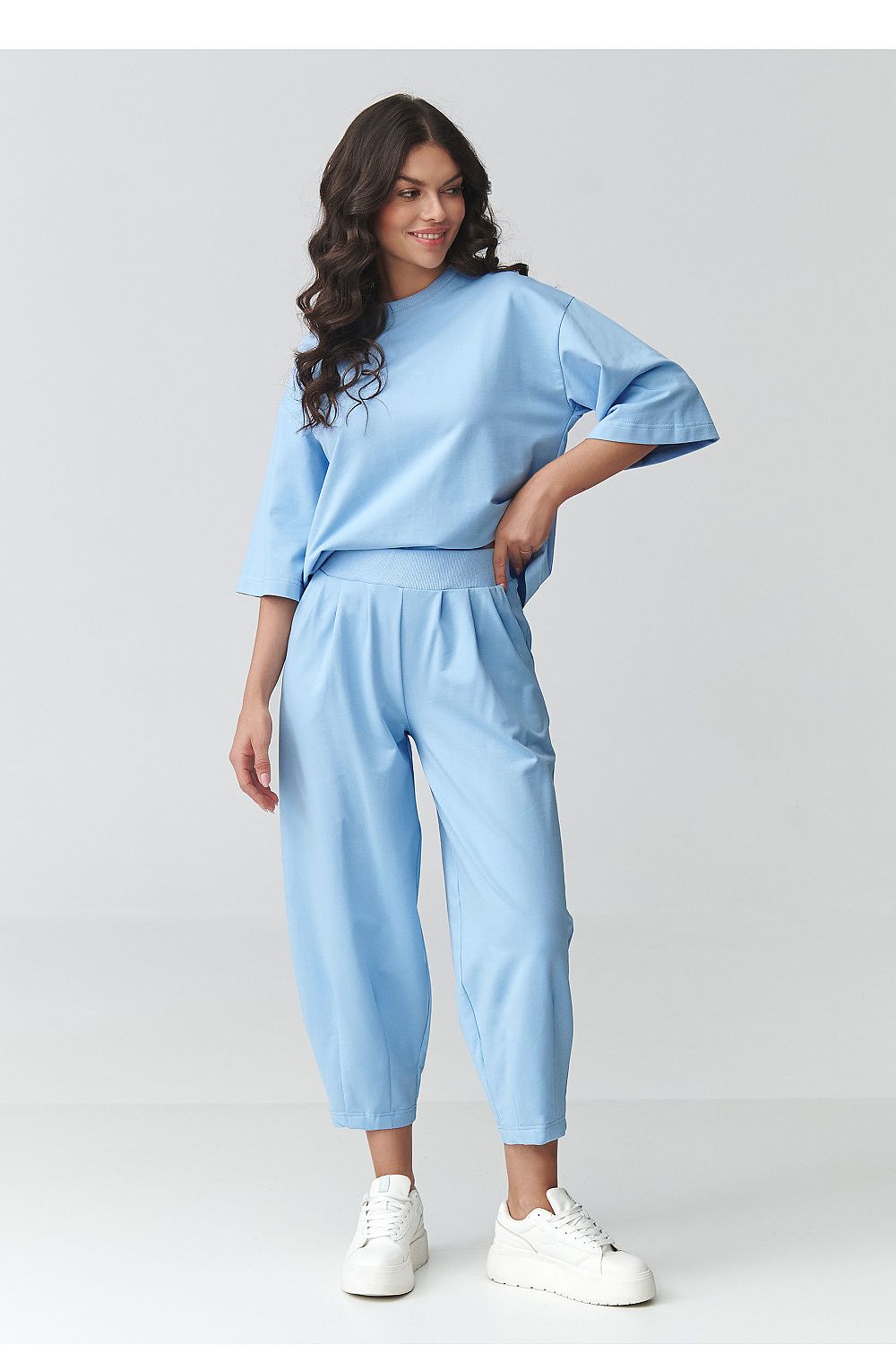 Light blue Makadamia tracksuit set with relaxed fit top and cropped trousers for casual wear