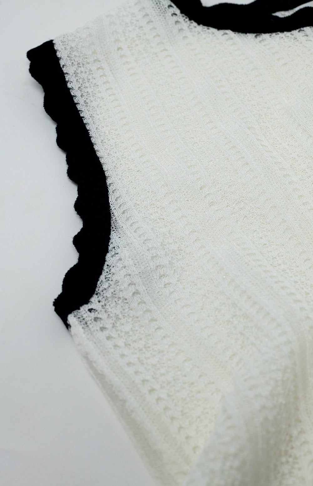 white knitted pointelle top with black wavy trim - Jumpers