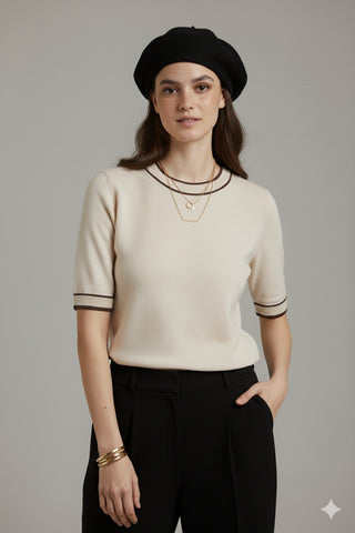 White short sleeve sweater with black line detail
