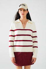 white sweater with dark red stripes and wide v neck