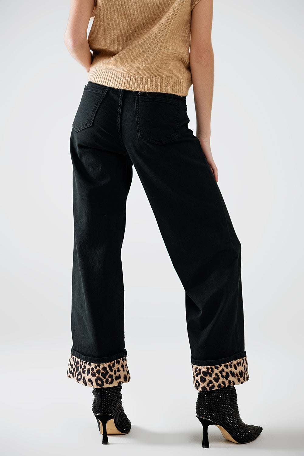 Wide leg black pants with leopard print at the bottom - Trousers