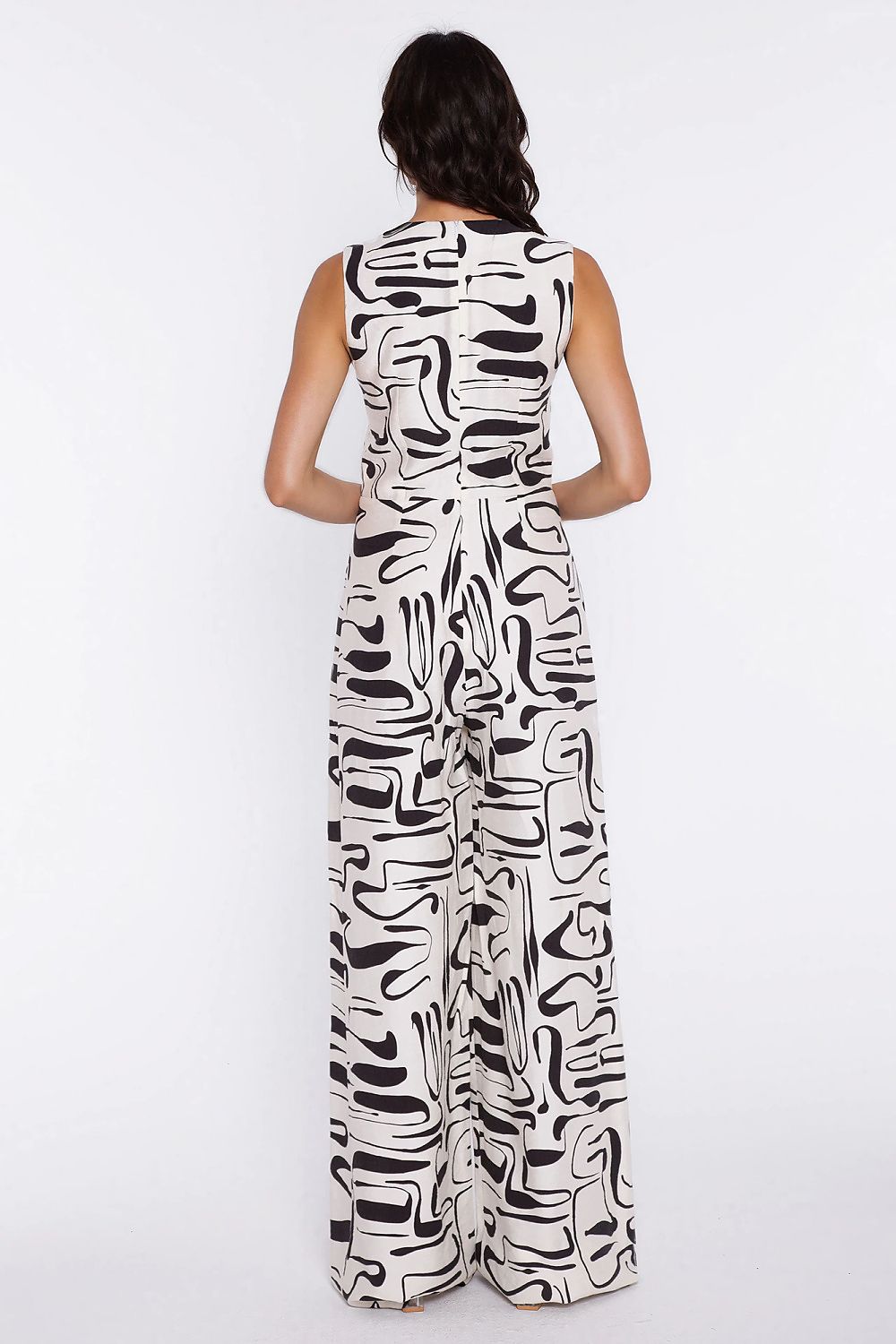 Nife Wide-Leg Jumpsuit in abstract black and white print showing back view and flowing design