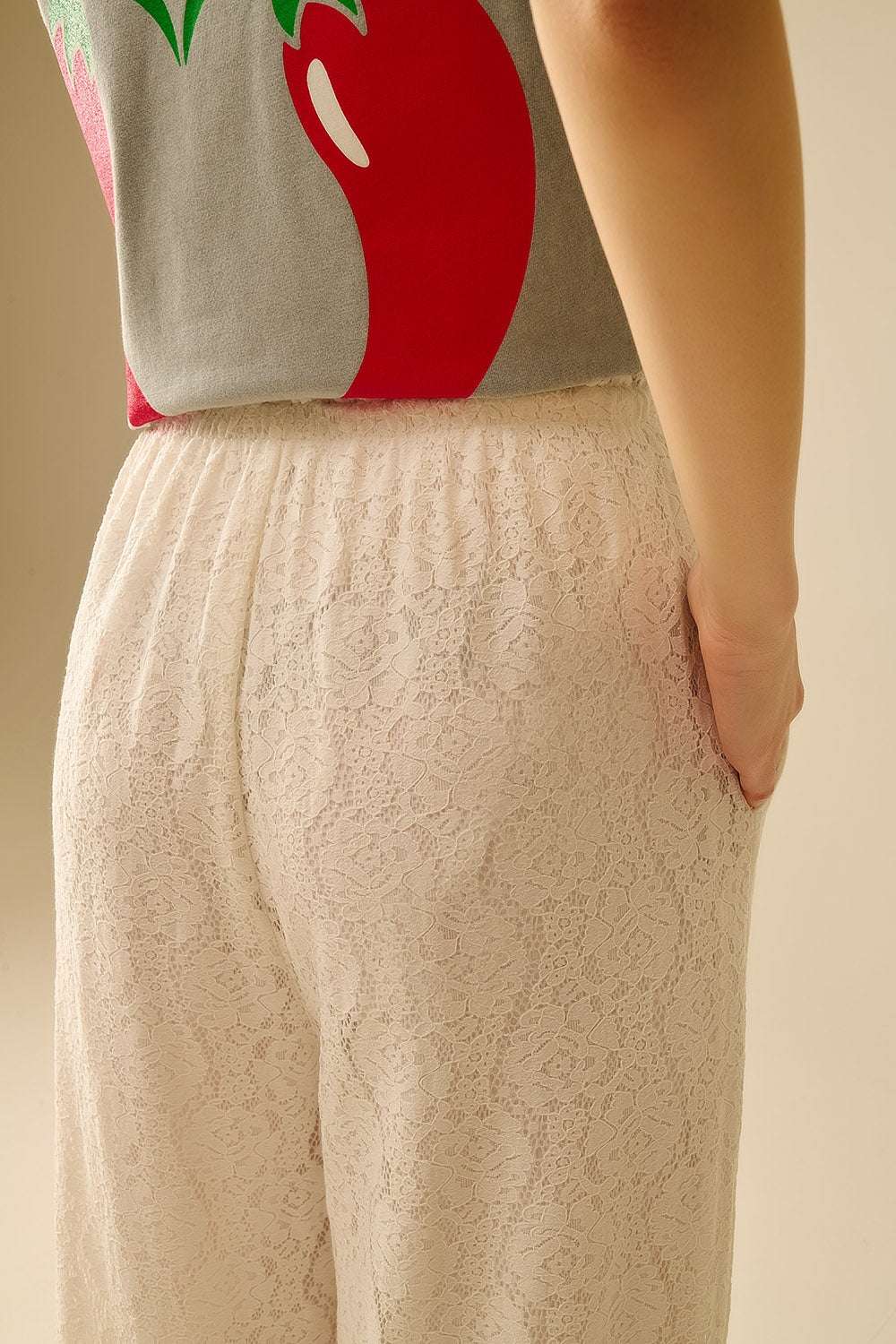 wide-legged lace pants with elastic waistband - Trousers