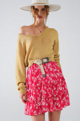 Pull léger à col en V large avec détails tressés en or