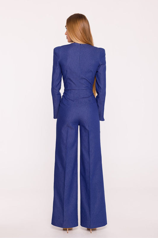 Back view of Moe women's denim jumpsuit with wide-leg design and structured shoulders in blue