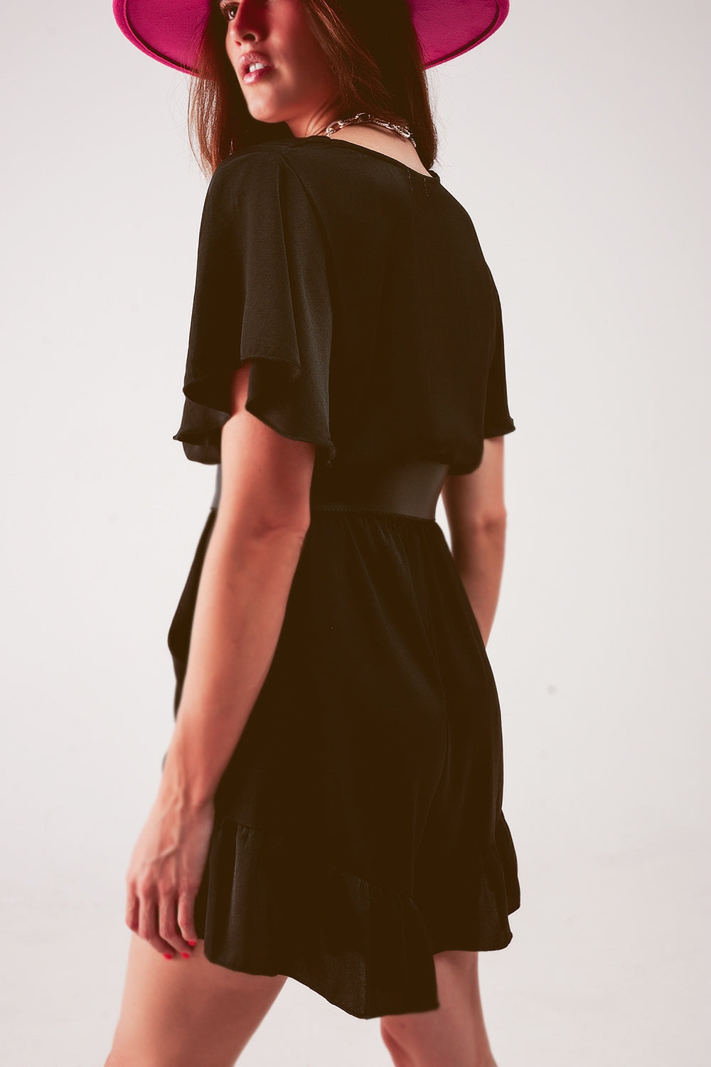 Wrap front frill hem jumpsuit in black - Dresses