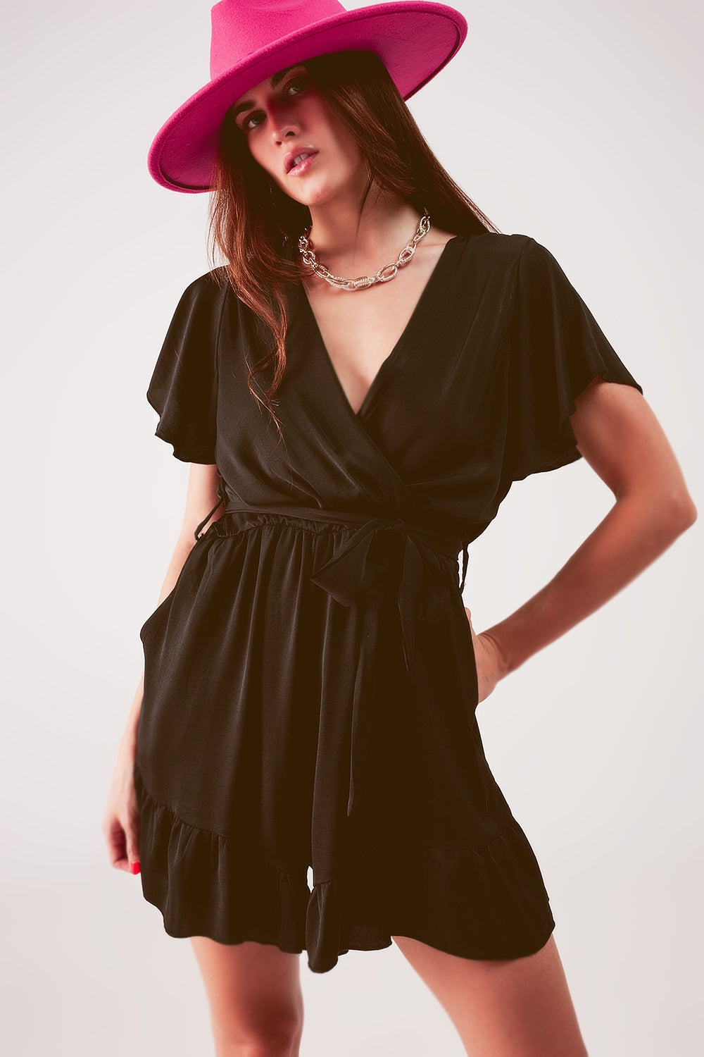 Wrap front frill hem jumpsuit in black - Dresses