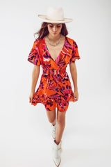 Robe courte portefeuille à manches ange et imprimé floral abstrait