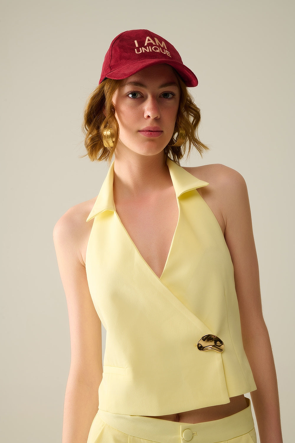 Yellow wrap vest with detailed gold button - Vests